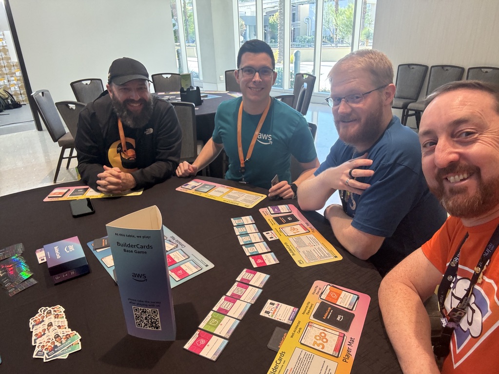 Karl Robinson & Jon Goodall learning to play AWS Builder Cards at re:Invent 2024